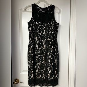 Lacy black and nude dress